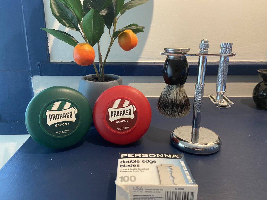 Shaving Kit showing Proraso Soaps, Viking Blade Badger Brush, Merkur Razor, Personna Blades, and Perfecto Razor+Brush Stand